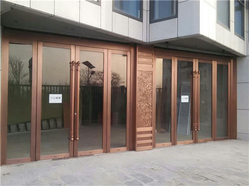 木纹玻璃铜门
